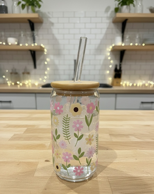 Glass tumbler with pink and yellow floral design, bamboo lid and reusable straw